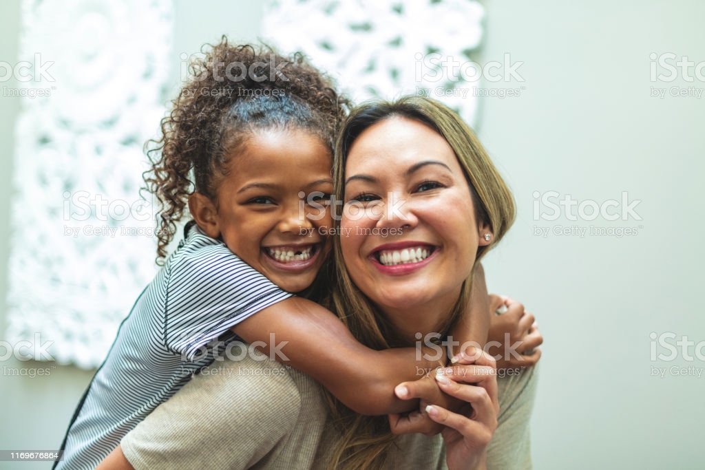 asian-mother-with-daughter-of-mixed-chinese-and-african-american-at-picture-id1169676864